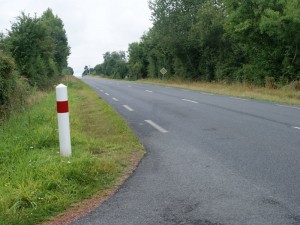 The D 675 viewed in towards the town of Villers-Bocage