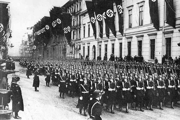 Men of the Leibstandarte march past Adolf Hitler. They would soon acquire the nickname “Asphalt Soldiers”