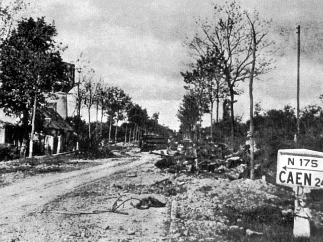 The view back down the RN 175 towards Caen. The trail of the morning’s destruction is evident