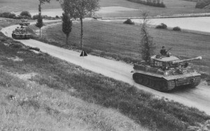 Led by Wittmann's Tiger Nr. 205, Tigers of the Second Company head towards the area surrounding the town of Villers-Bocage, June 1944